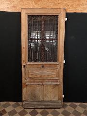 Haustür mit Glasfüllung und Gitter aus Eiche, ca. B 230 x H 95 cm DIN li