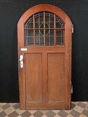 Haustür mit Rundbogen und Bleiglaseinstatz aus Eiche, ca. B 94 cm x H 213 cm